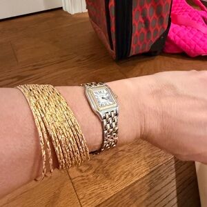 Gold plated bronze inside 12 gold bangles 
Brand new